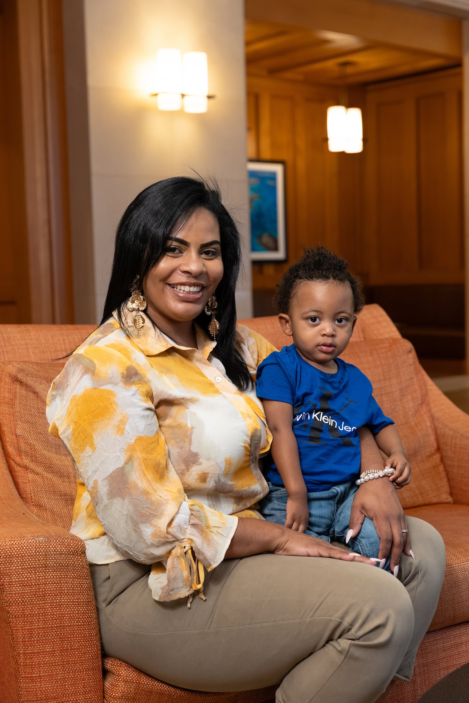 Tatiana Rodriguez holding her young son.
