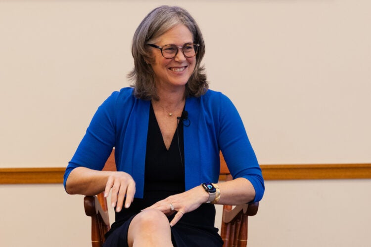 Sheila Heen sitting in the ceremonial chair.