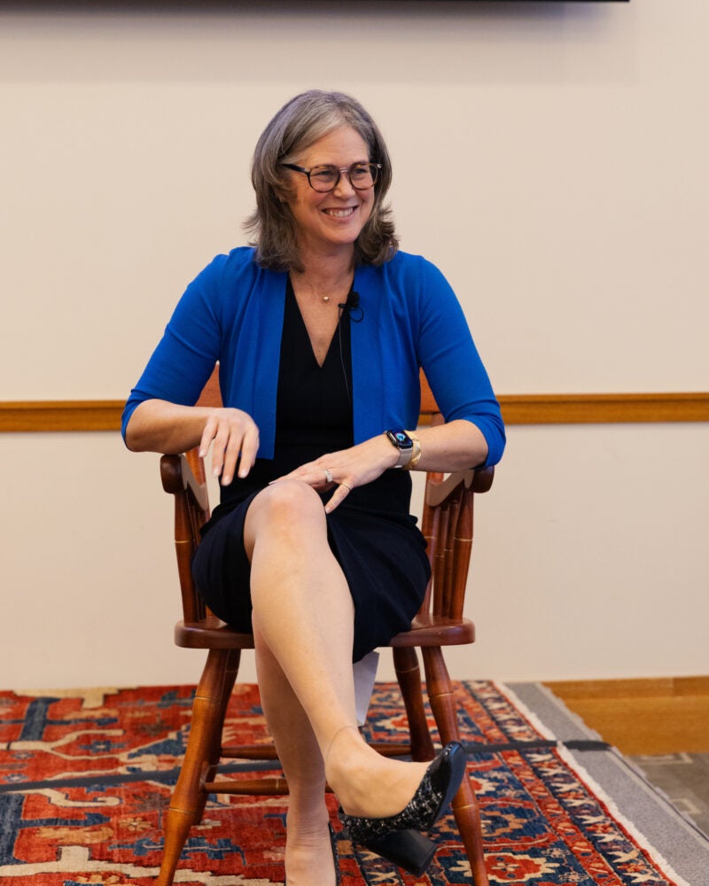 Sheila Heen sitting in the ceremonial chair.
