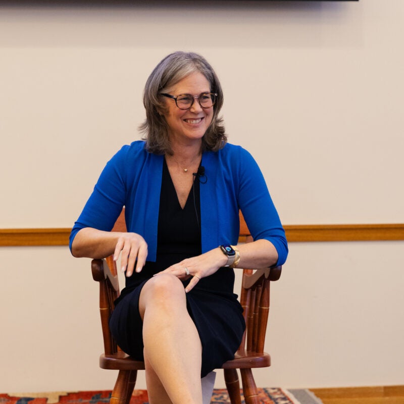 Sheila Heen sitting in the ceremonial chair.