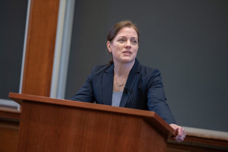 Kristen Eichensehr at the podium.