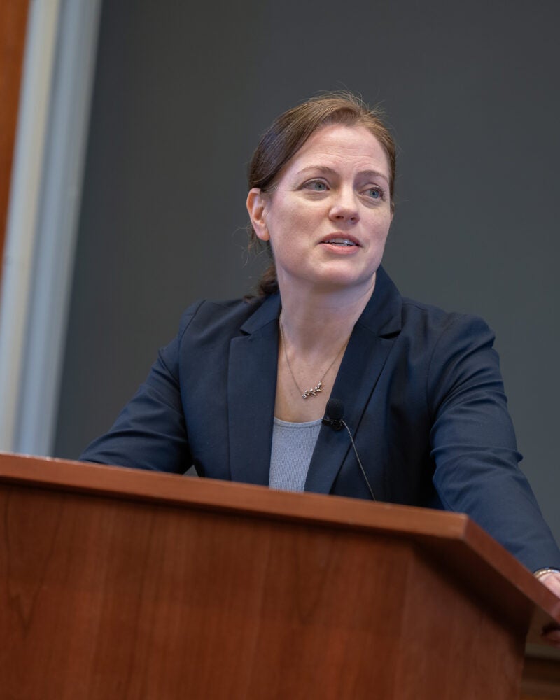 Kristen Eichensehr at the podium.