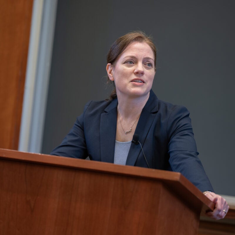 Kristen Eichensehr at the podium.