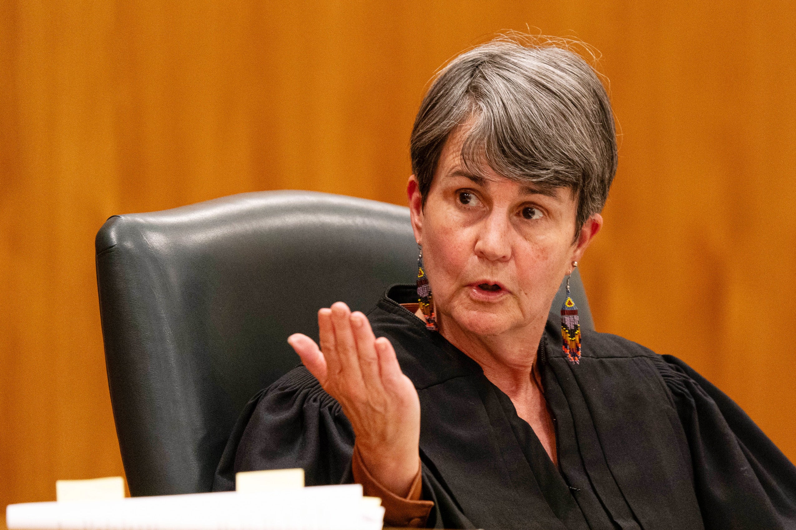 Susan M. Carney speaking from the bench in a courtroom.