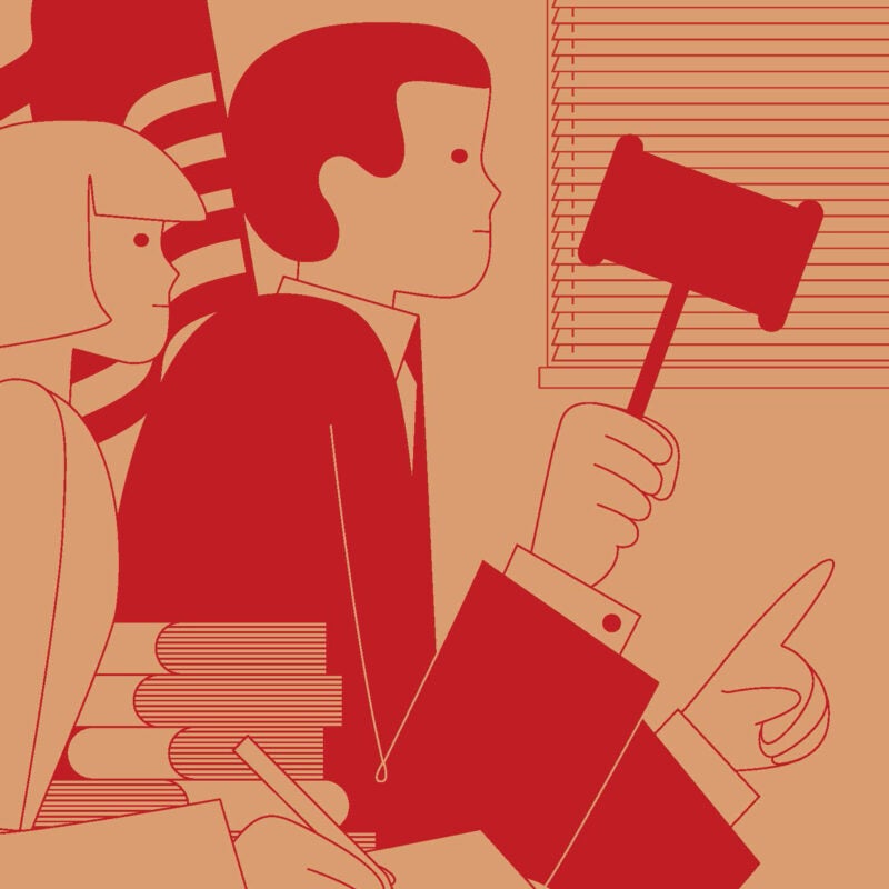 An illustration of a judge holding a in a courtroom and his clerk taking notes near a pile of law books in a courtroom.