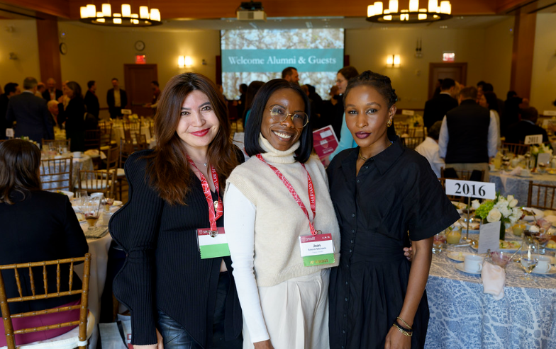 Alumni posing together for a photo