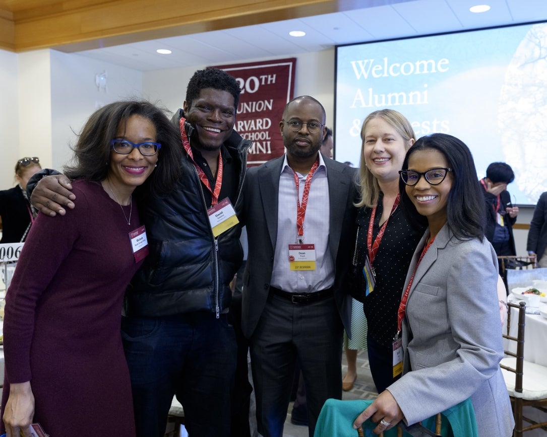 Alumni posing together for a photo