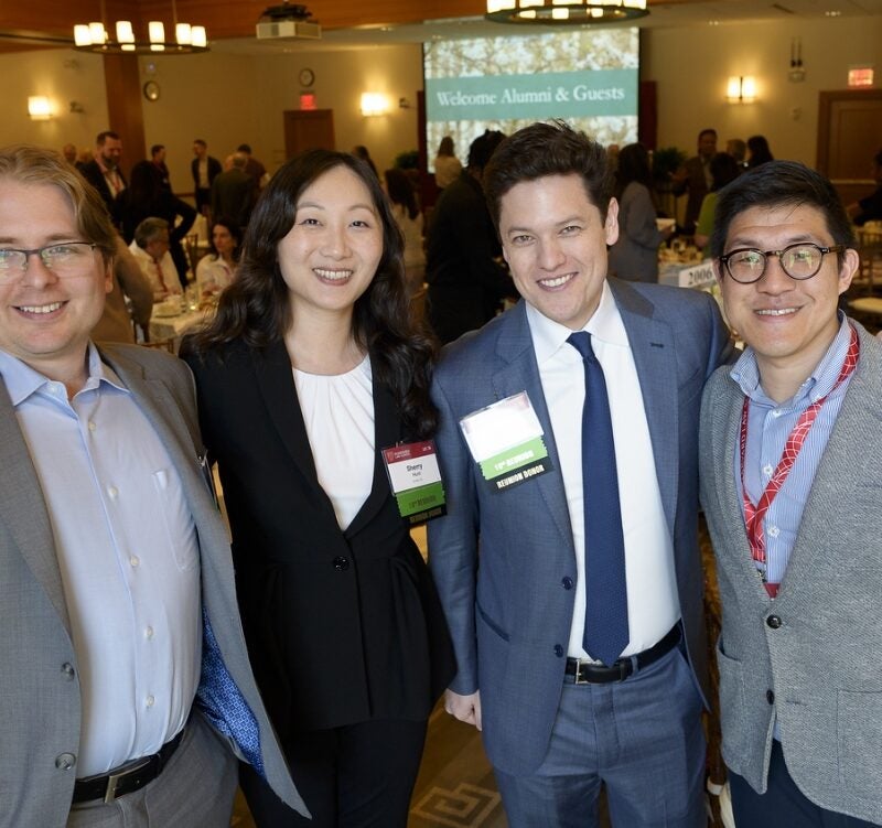 Alumni posing together for a photo