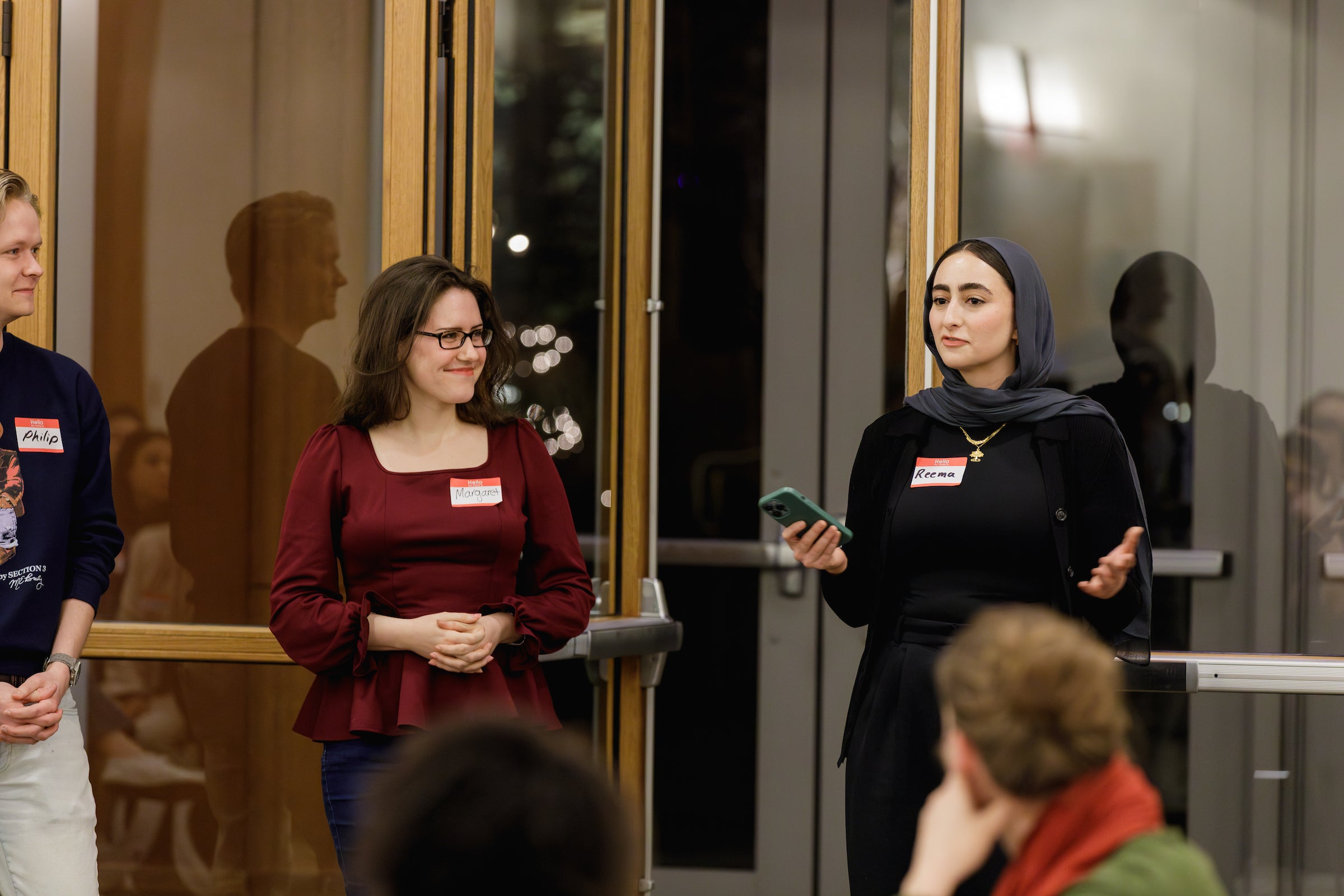 Students speaking at the 2024 Interfaith Dinner.
