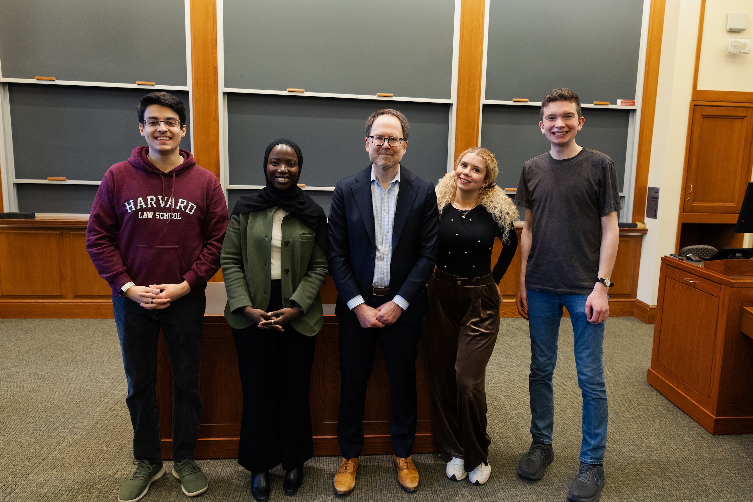 Ben Sachs poses for a photo with some of the class marshals.