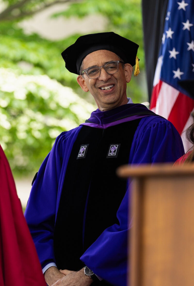 Dean Goldberg converses with Harvard Law Professors onstage during commencement.