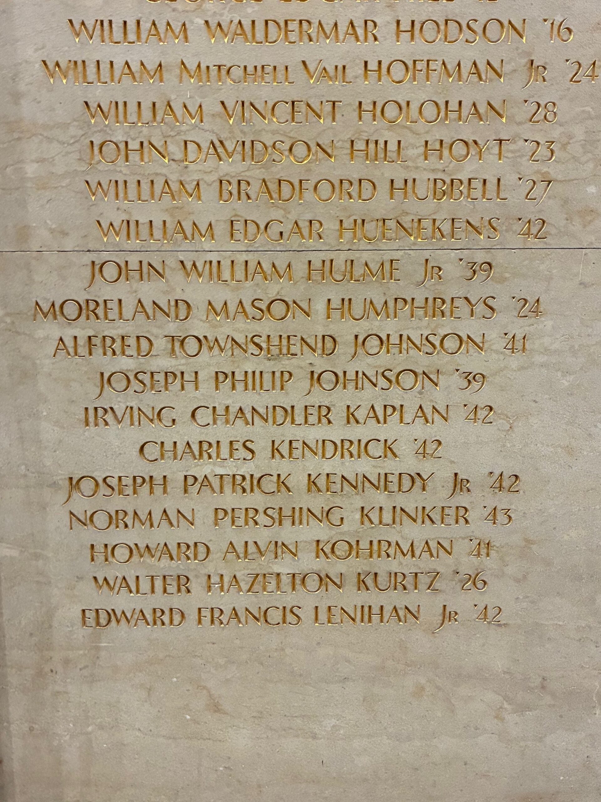 Close up of names on memorial wall.