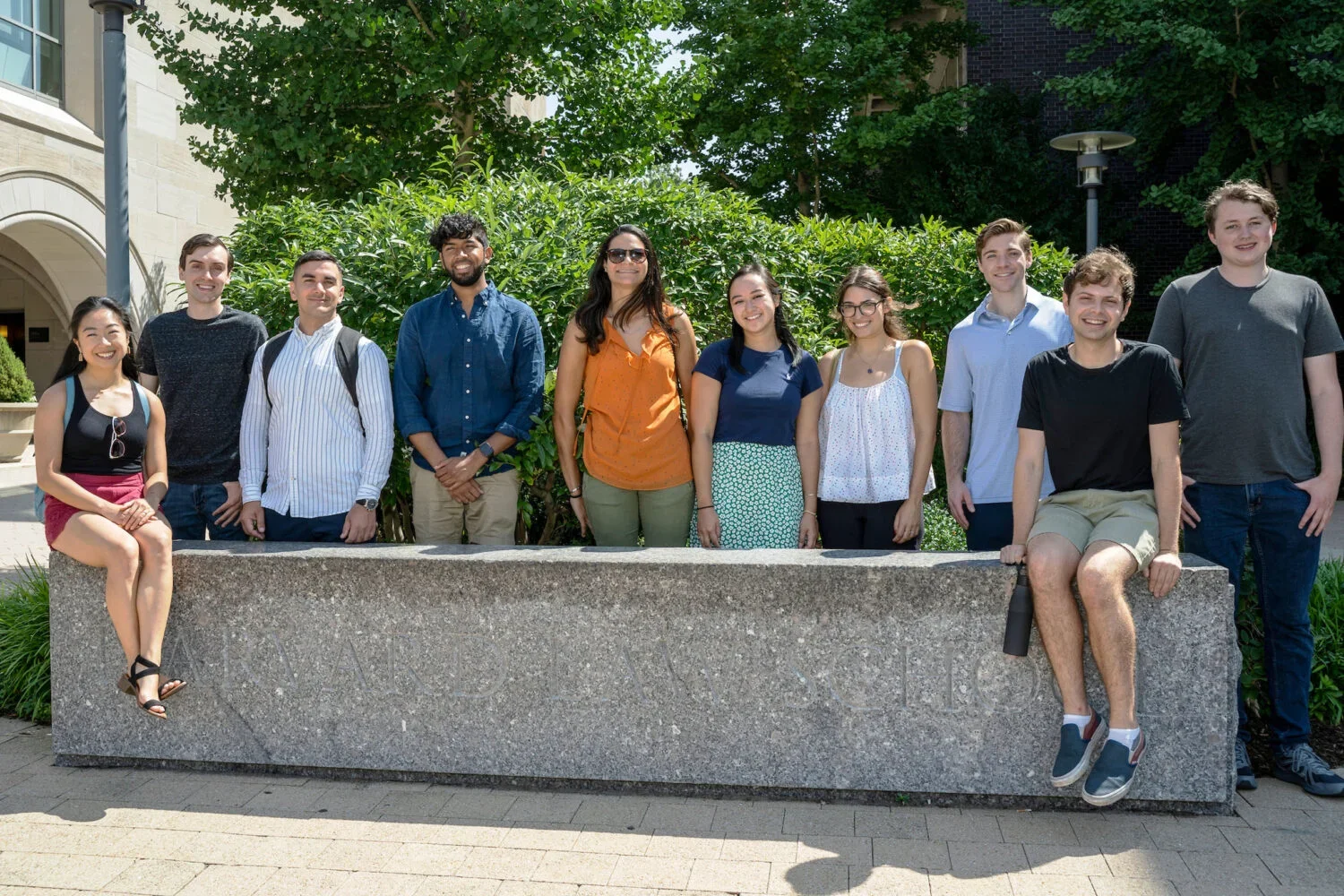 Young alumni posing together for a photo