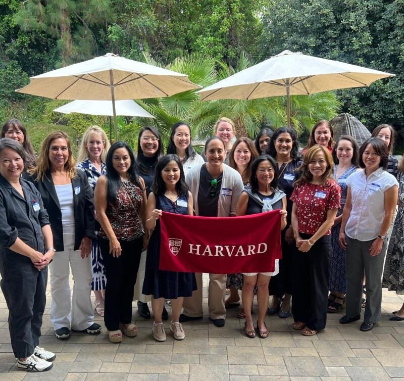 Alumni posing together for the Annual Women's Brunch photo