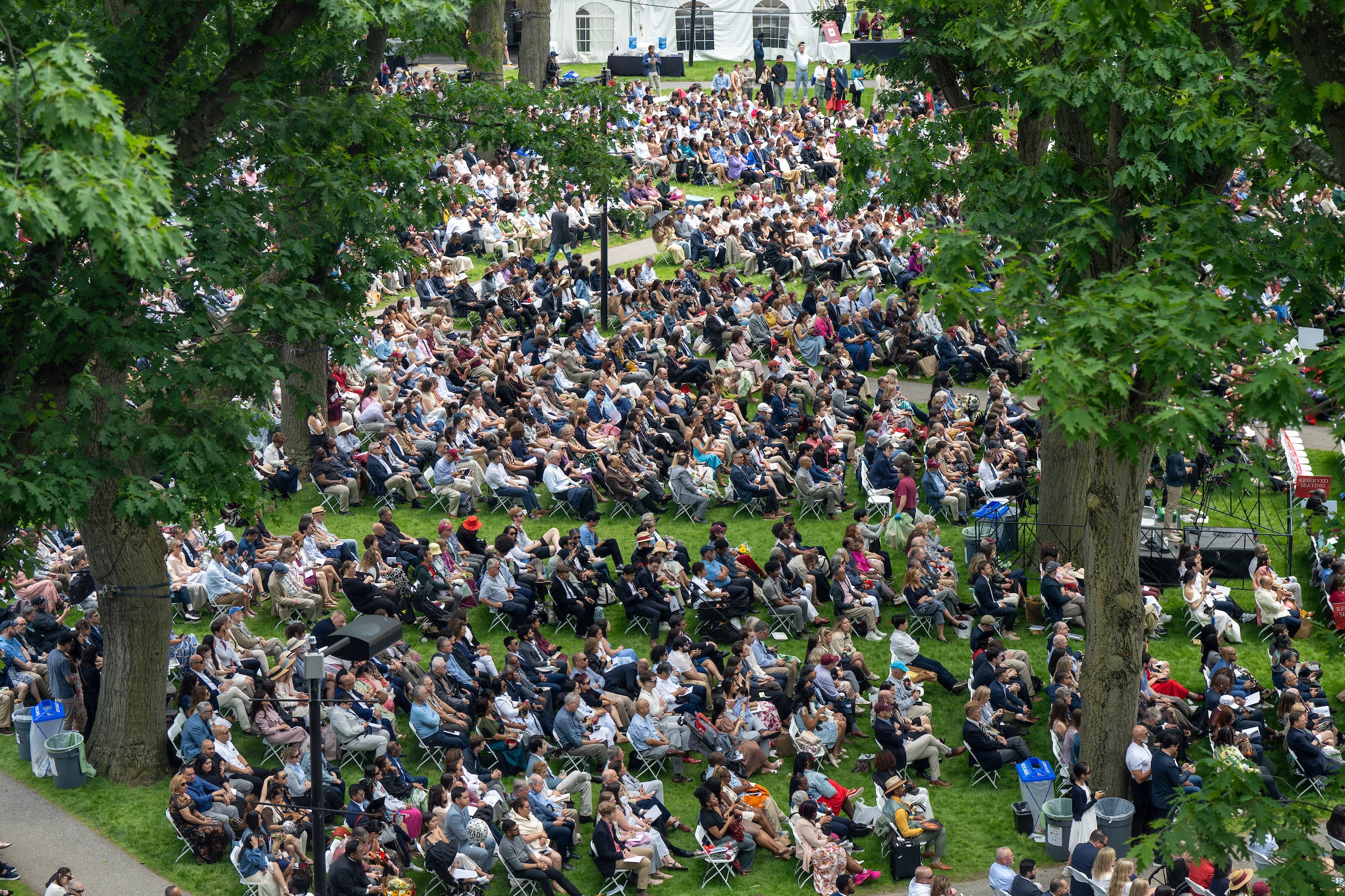 Aerial view of Commencement audience on Holmes Field