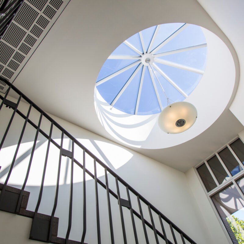 A view of a spiral staircase in Hauser Hall.