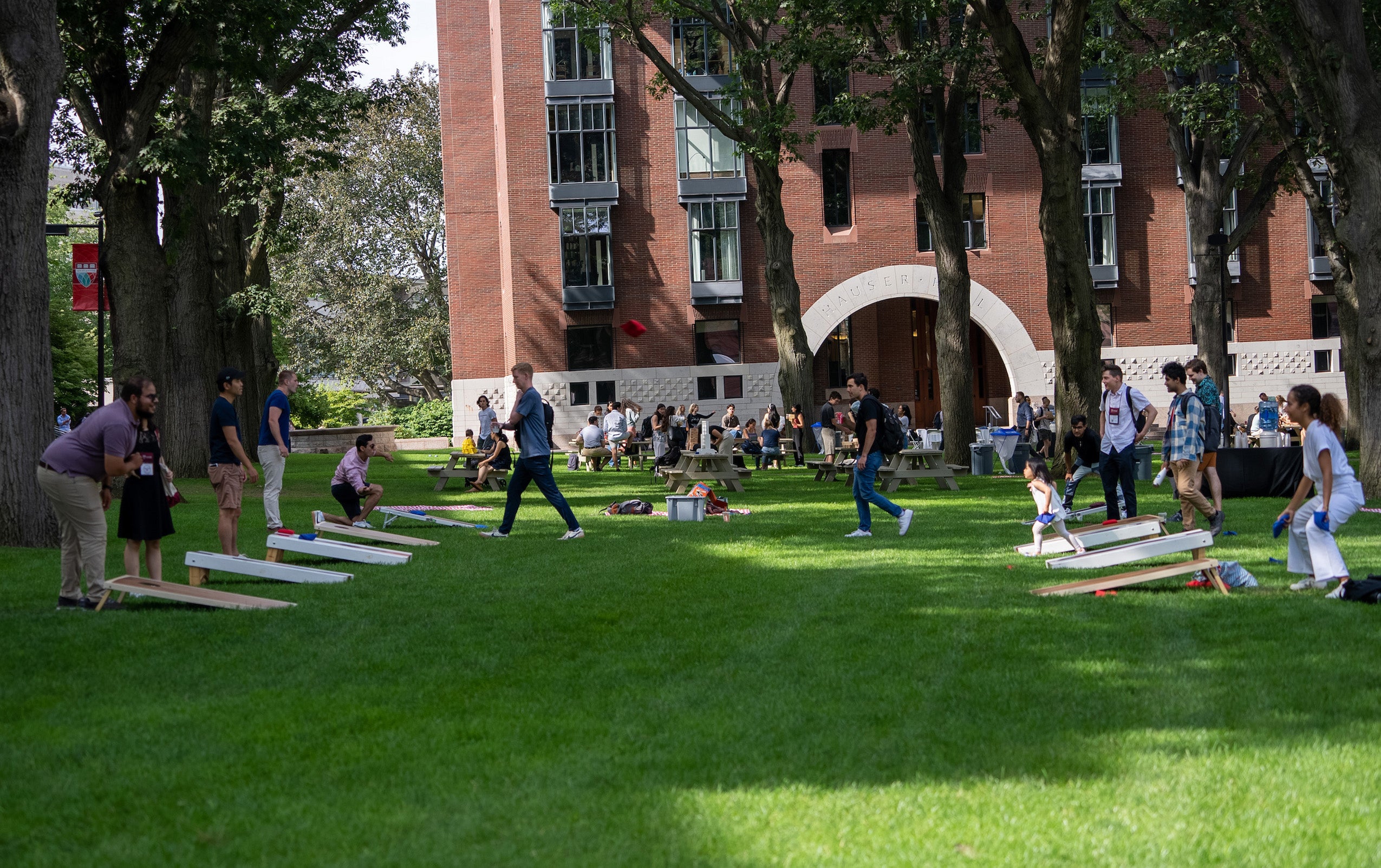 Students take part in some lawn games in front of Hauser Hall.