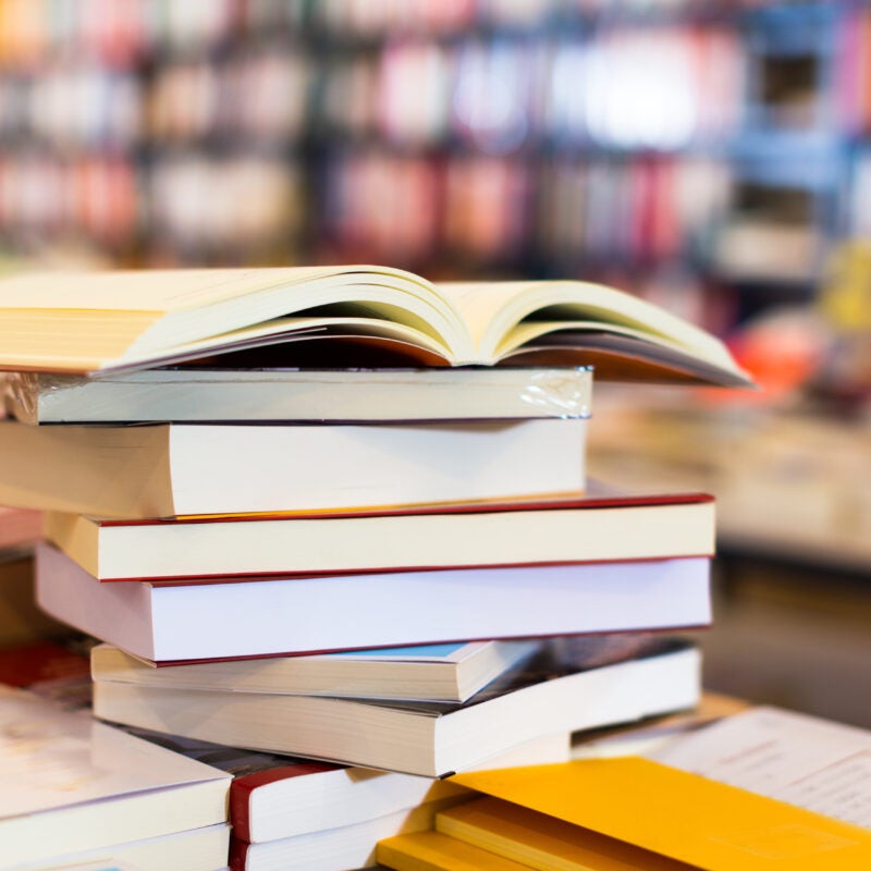 stack of books lying on table