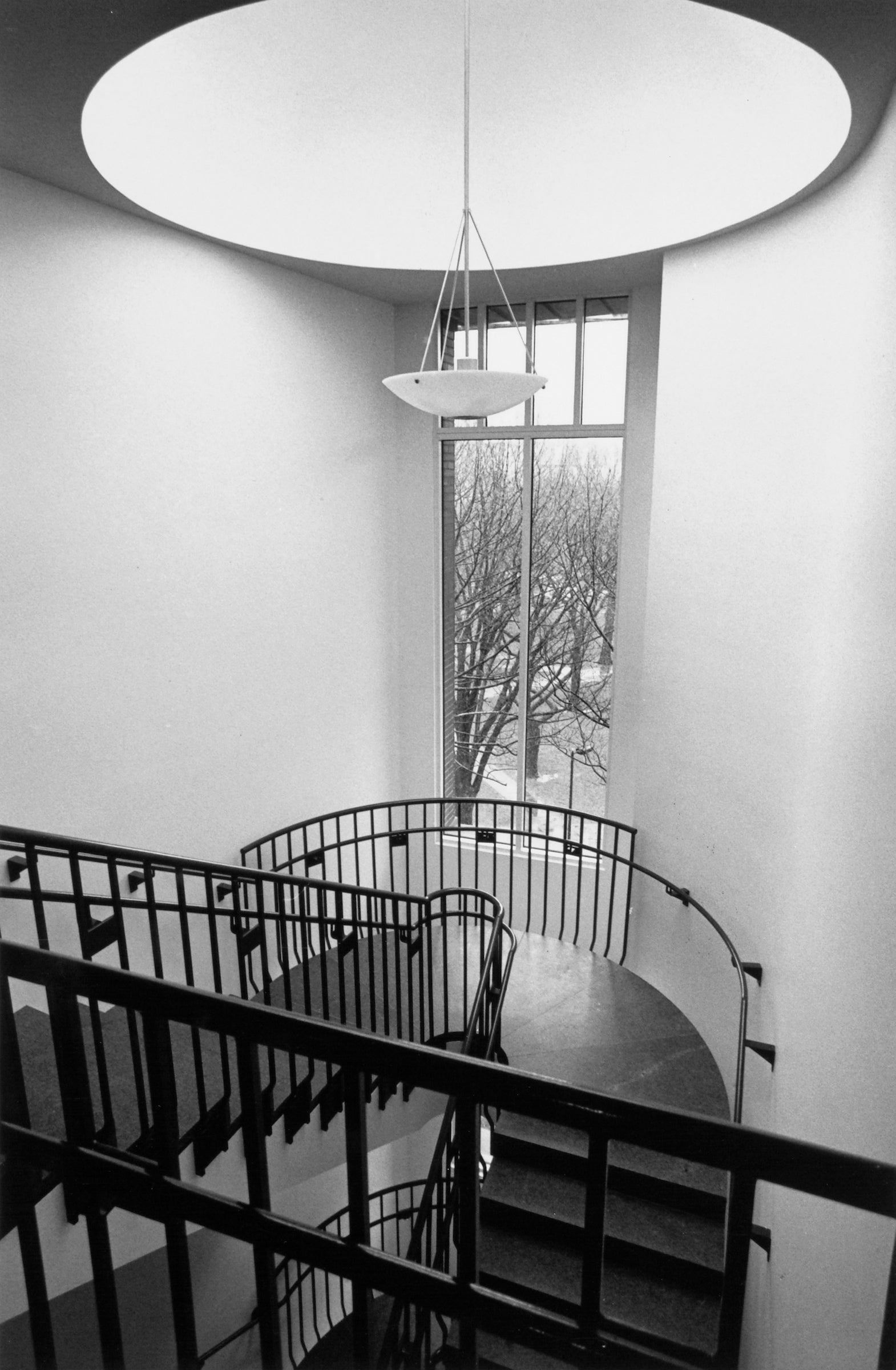 A view of a spiral staircase in Hauser Hall.