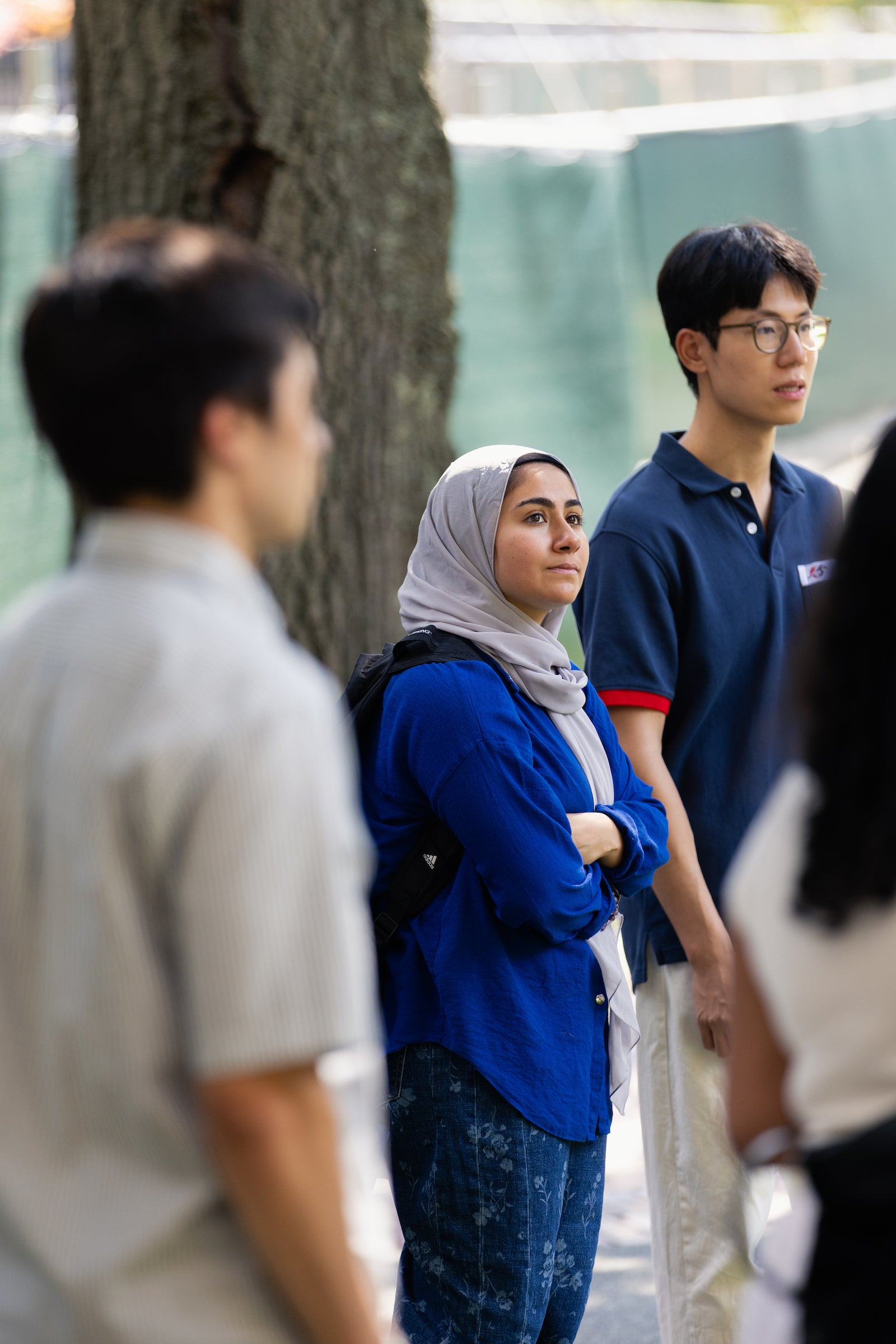 A student looks around while on a campus tour.