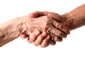 Wrinkled hand holding younger hand.