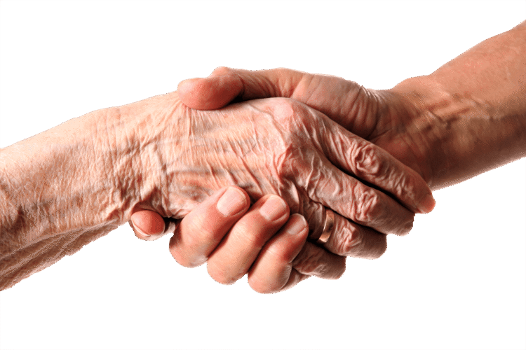 Wrinkled hand holding younger hand.