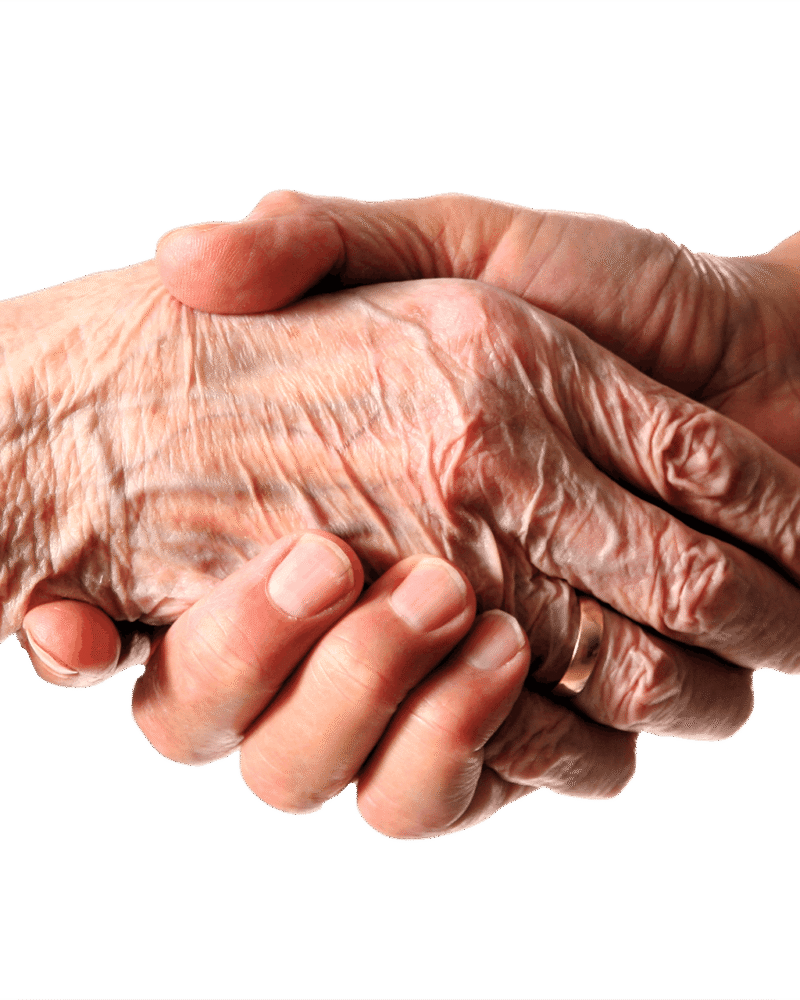 Wrinkled hand holding younger hand.