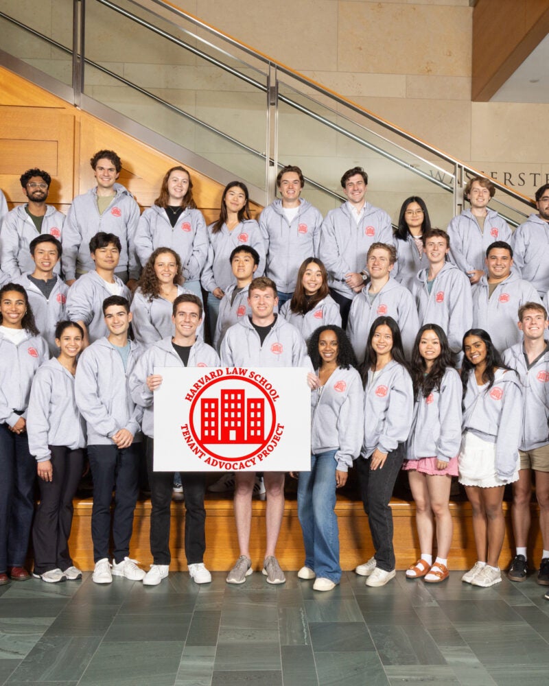 the TAP 25-26 student body poses in the WCC lobby with their sign in matching sweatshirts