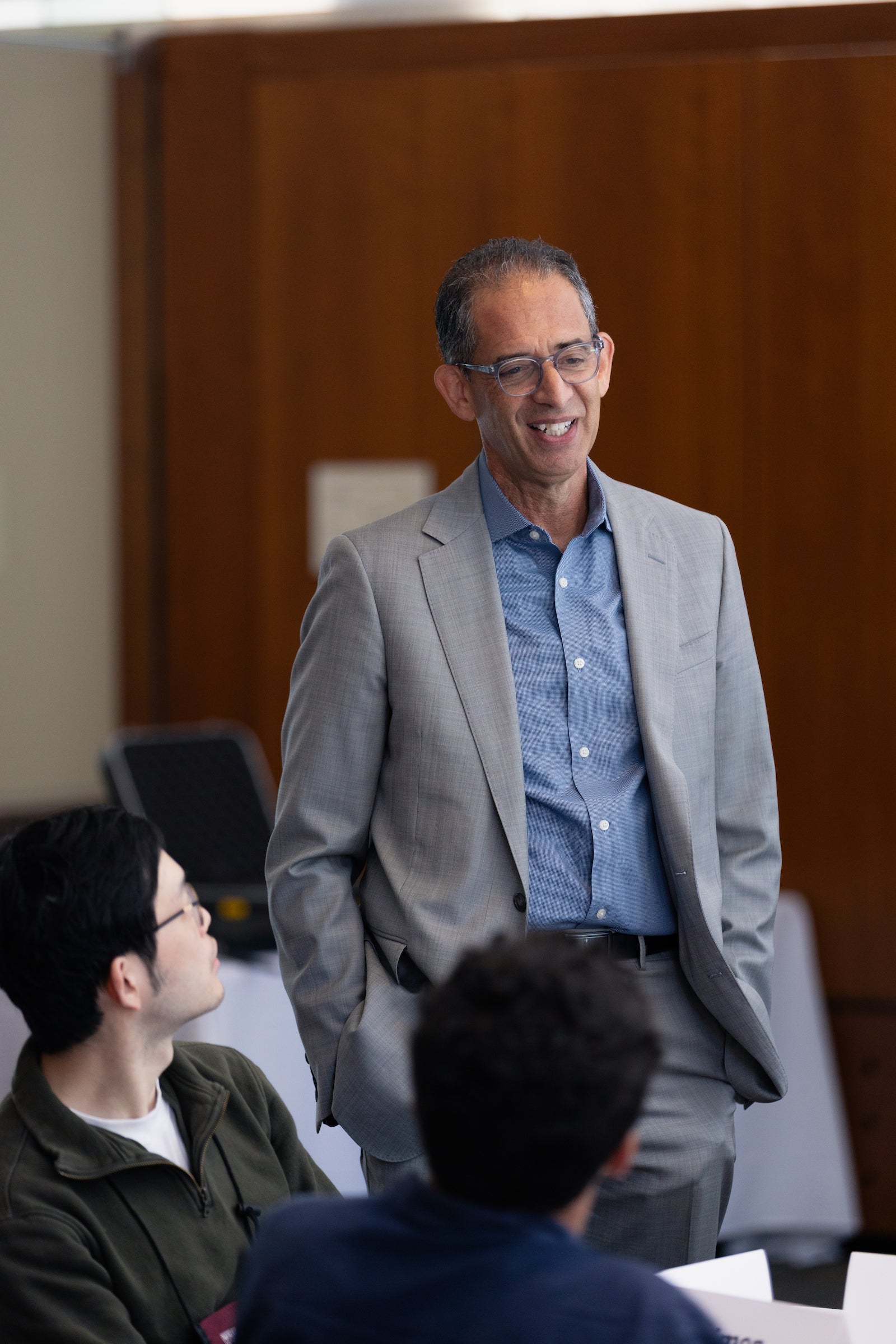 Dean Goldberg converses with students.