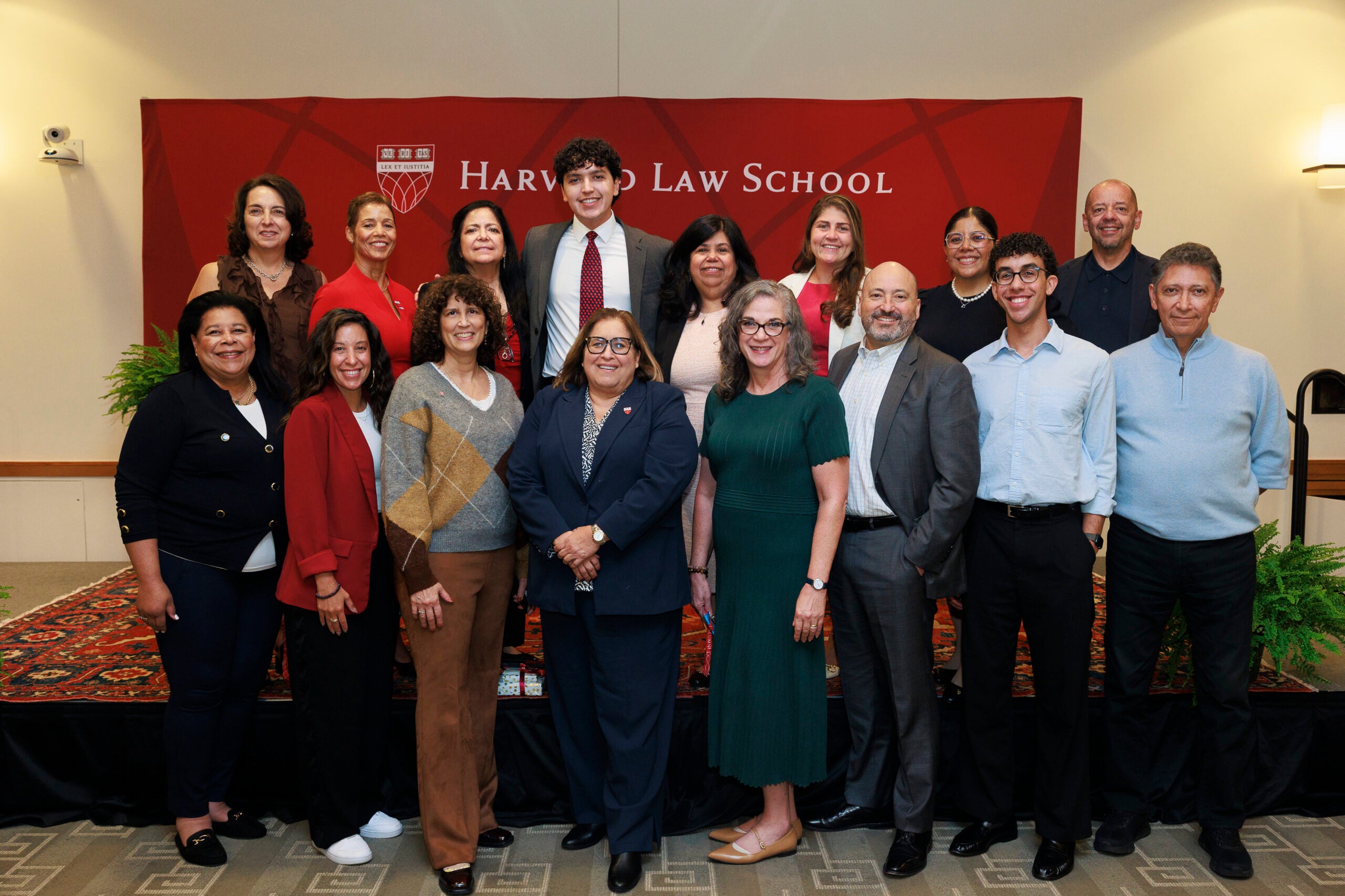 Group of CLA committee members and speakers posing together.