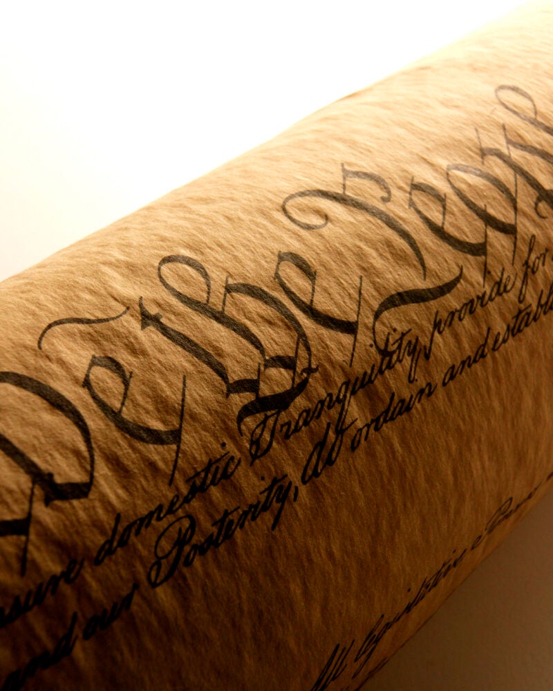 Close up of a scrolled U.S. Constitution