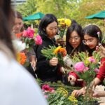 A group of students creating bouquets
