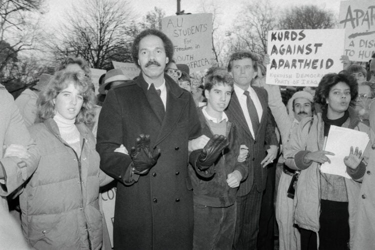 Randall Robinson with Rory and Douglas Kennedy at a demonstration.