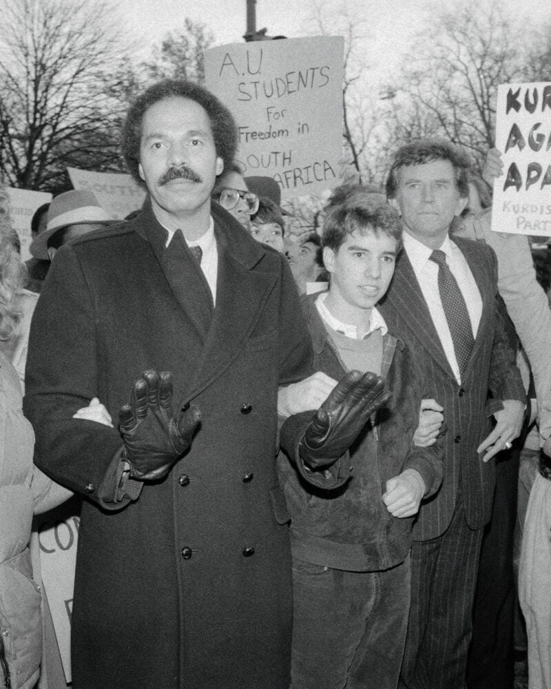 Randall Robinson with Rory and Douglas Kennedy at a demonstration.
