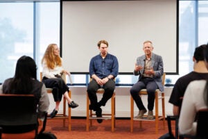 Host Moira Weigel (from left) with panelists Jackson Kernion of Anthropic and Ken Archer of Microsoft.
