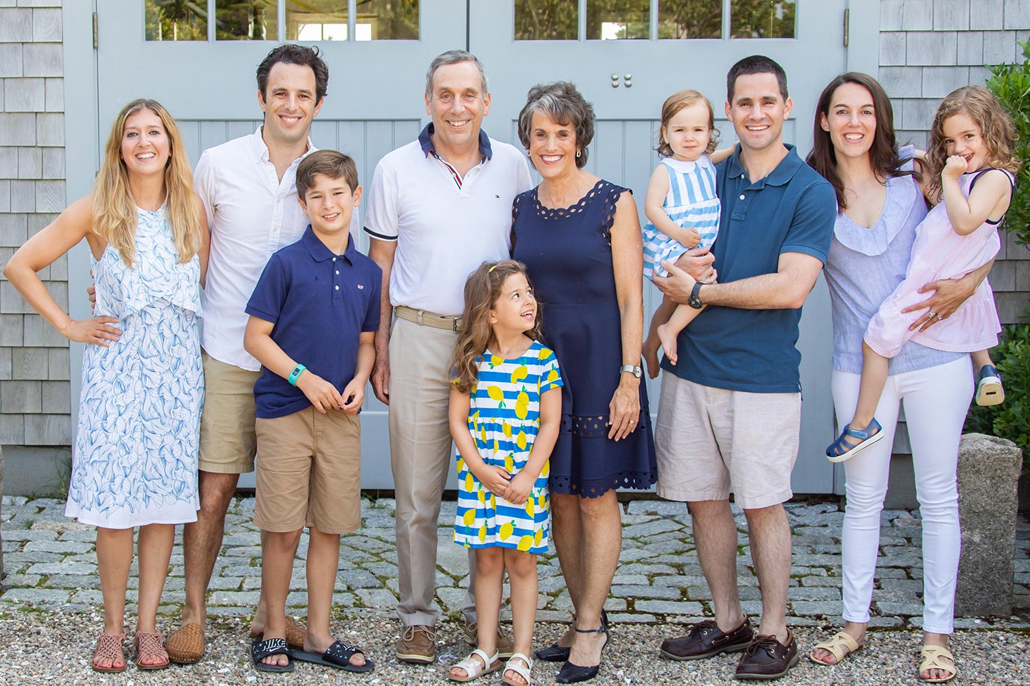 Lawrence Bacow and family posing together for a photo