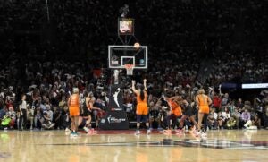 Someone shooting free throw at WNBA game