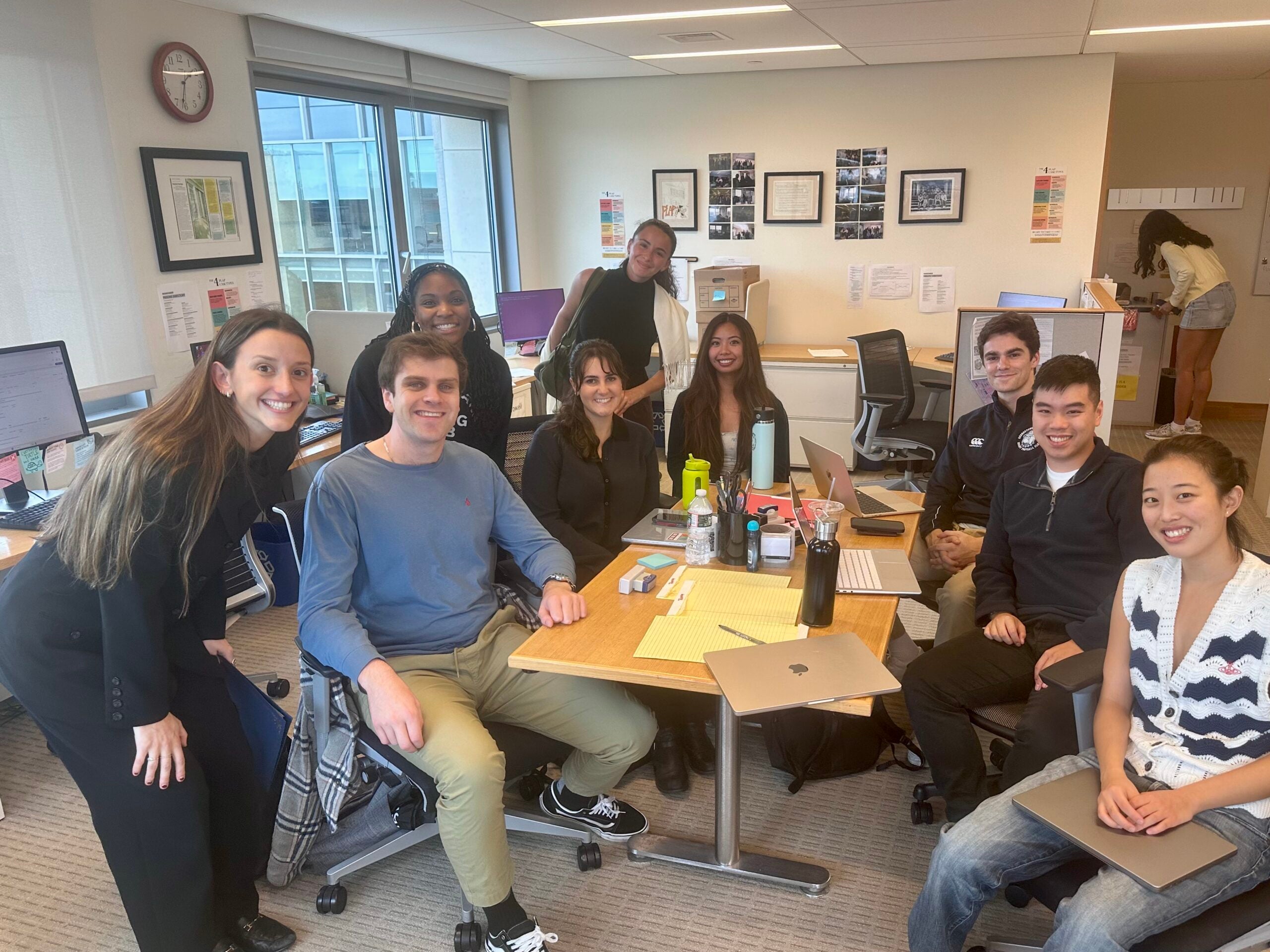 PLAP students around a conference table