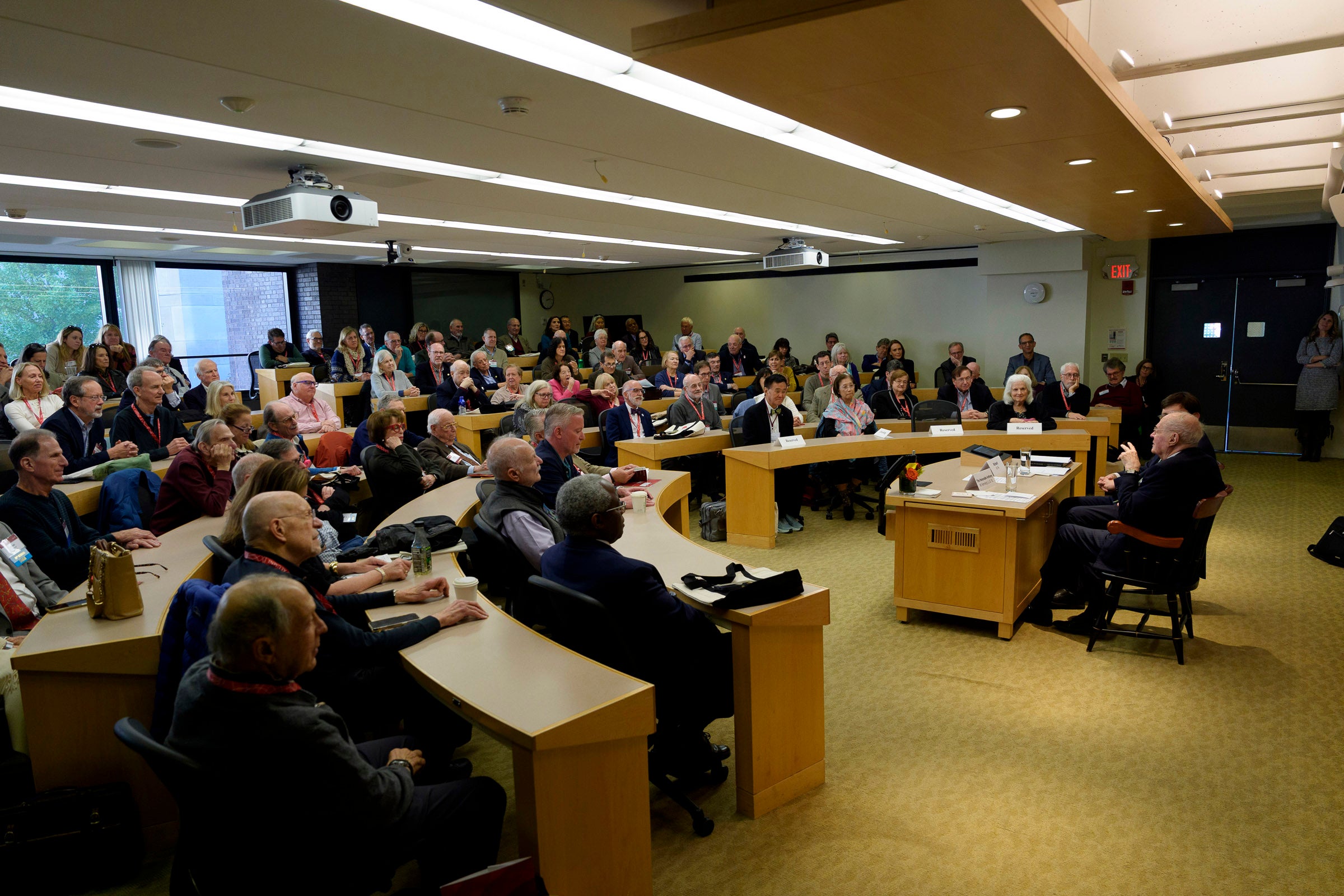 Anthony Kennedy and Richard Re speaking to a classroom full of listeners.