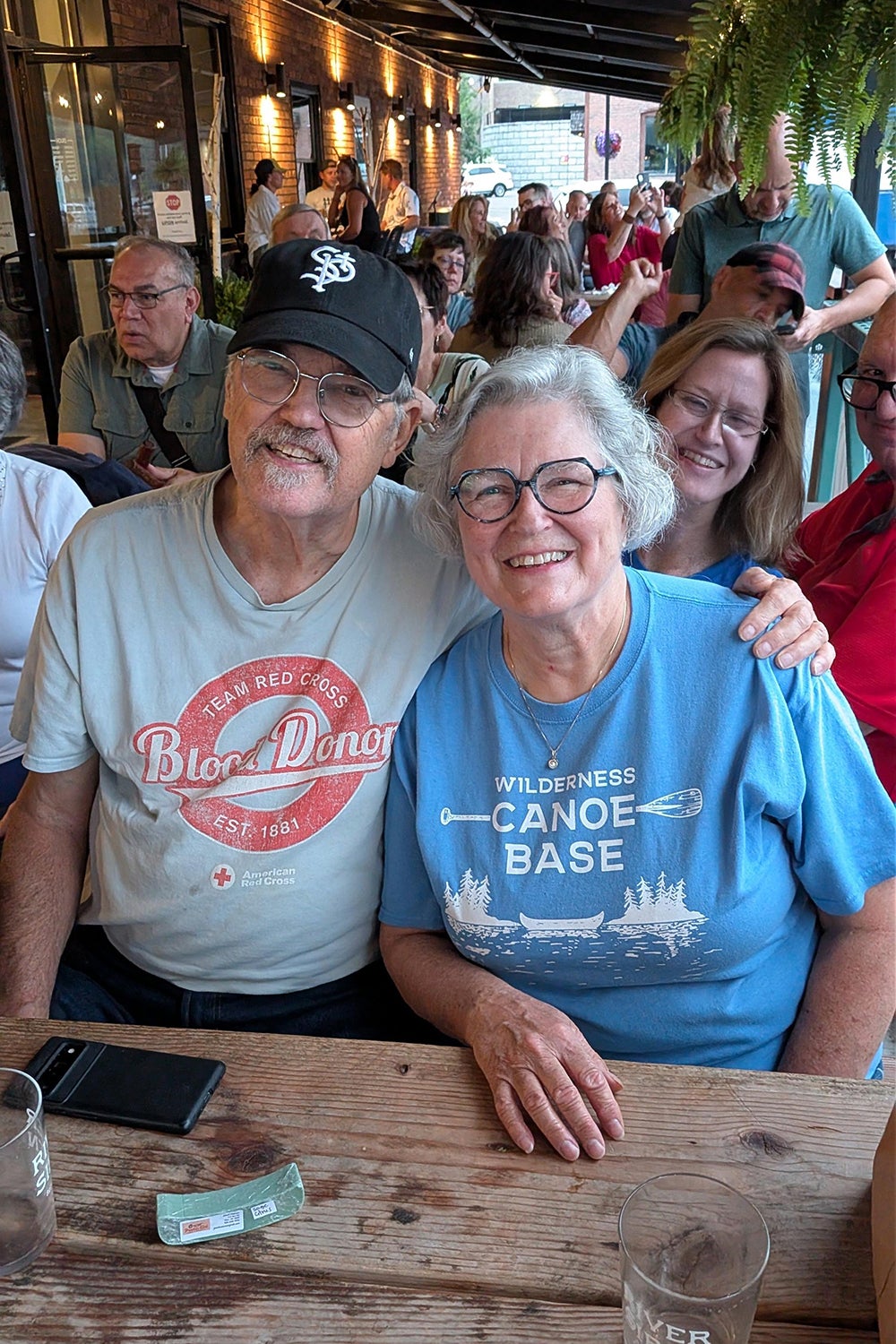 Darron Knutson and wife sitting smiling together